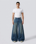 Session Baggy Jeans Spliced Blue on model — mega baggy fit covering sneakers