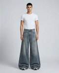 Big Easy Baggy Jeans Flex Indigo on model — mega baggy fit covering sneakers