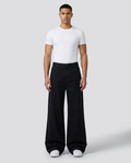 Easy Cargo Jeans Black on model — mega baggy fit covering sneakers