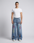 Slack Jeans — Ink Drip on model — mega baggy fit covering sneakers