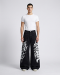 Slack Jeans — Totem Clay on model — mega baggy fit covering sneakers