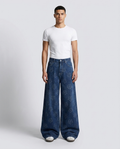 Slack Jeans — Crochet Bloom on model — mega baggy fit covering sneakers