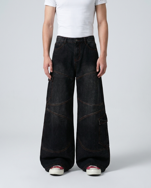 Boulevard Cargo Jeans — Onyx on model — mega baggy fit covering sneakers