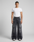 Foreman Jeans — Iron Wash on model — mega baggy fit covering sneakers