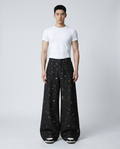 Boulevard Distressed Jeans — Frayed Weave on model — mega baggy fit covering sneakers