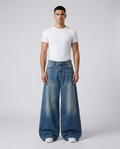 Easy Jeans Heritage Wash on model — mega baggy fit covering sneakers
