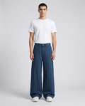 Easy Jeans Tide Stripe on model — mega baggy fit covering sneakers