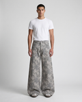 Easy Jeans Garden Weave on model — mega baggy fit covering sneakers