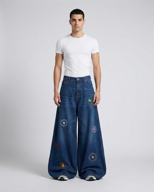 Big Easy Embroidered Jeans Petal Blue on model — mega baggy fit covering sneakers