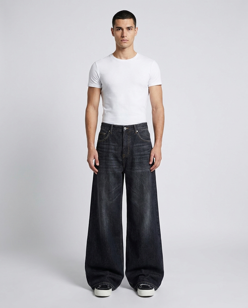 Big Easy Jeans Night Bloom on model — mega baggy fit covering sneakers