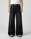 Easy Jeans Soft Black on model — mega baggy fit covering sneakers
