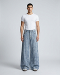 Maxout Jeans Air Weave on model — mega baggy fit covering sneakers