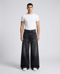 Easy Jeans Washed Black on model — mega baggy fit covering sneakers