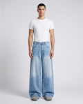 Maxout Jeans Glacier Blue on model — mega baggy fit covering sneakers