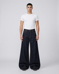 Maxout Jeans Split Night on model — mega baggy fit covering sneakers