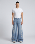 Big Easy Ripped Jeans Harbor Blue on model — mega baggy fit covering sneakers