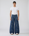 Cooper Jeans Balloon Blue on model — mega baggy fit covering sneakers
