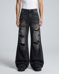 Session Ripped Jeans Torn Night on model — mega baggy fit covering sneakers
