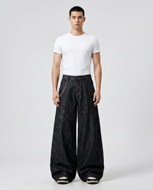 Big Easy Jeans Carbon on model — mega baggy fit covering sneakers
