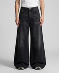 Big Easy Embroidered Jeans Halo Fade on model — mega baggy fit covering sneakers