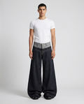 Cooper Jeans Double Dusk on model — mega baggy fit covering sneakers