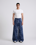 Boulevard Jeans Orchid Wash on model — mega baggy fit covering sneakers