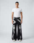 Session Jeans Tie Dye Smoke on model — mega baggy fit covering sneakers