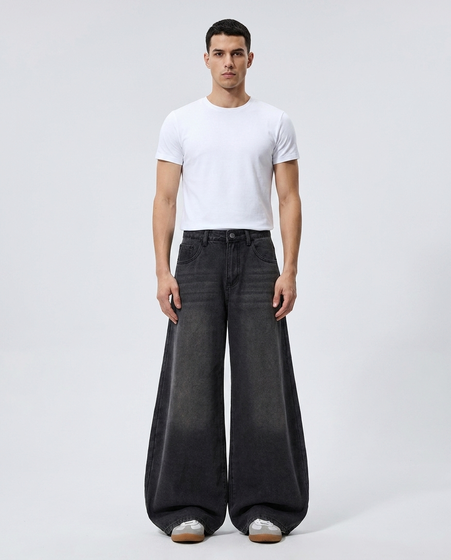 Big Easy Jeans Gunmetal on model — mega baggy fit covering sneakers