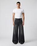 Easy Jeans Three Tone on model — mega baggy fit covering sneakers
