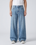 Maxout Jeans Shadow Weave on model — mega baggy fit covering sneakers