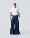 Easy Jeans Breeze Blue on model — mega baggy fit covering sneakers