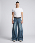 Cooper Jeans Riverbend on model — mega baggy fit covering sneakers