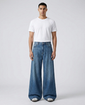 Easy Jeans Mainline on model — mega baggy fit covering sneakers