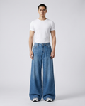 Easy Jeans Zephyr on model — mega baggy fit covering sneakers