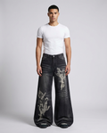Session Jeans Dark Hollow on model — mega baggy fit covering sneakers