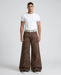 Slack Jeans Paisley Dusk on model — mega baggy fit covering sneakers