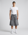 Maxout Carpenter Denim Shorts Trail Fade on model — baggy wide-leg jorts