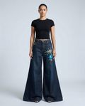 Women's Baggy Jeans Liberty Blue on model — mega baggy fit covering shoes