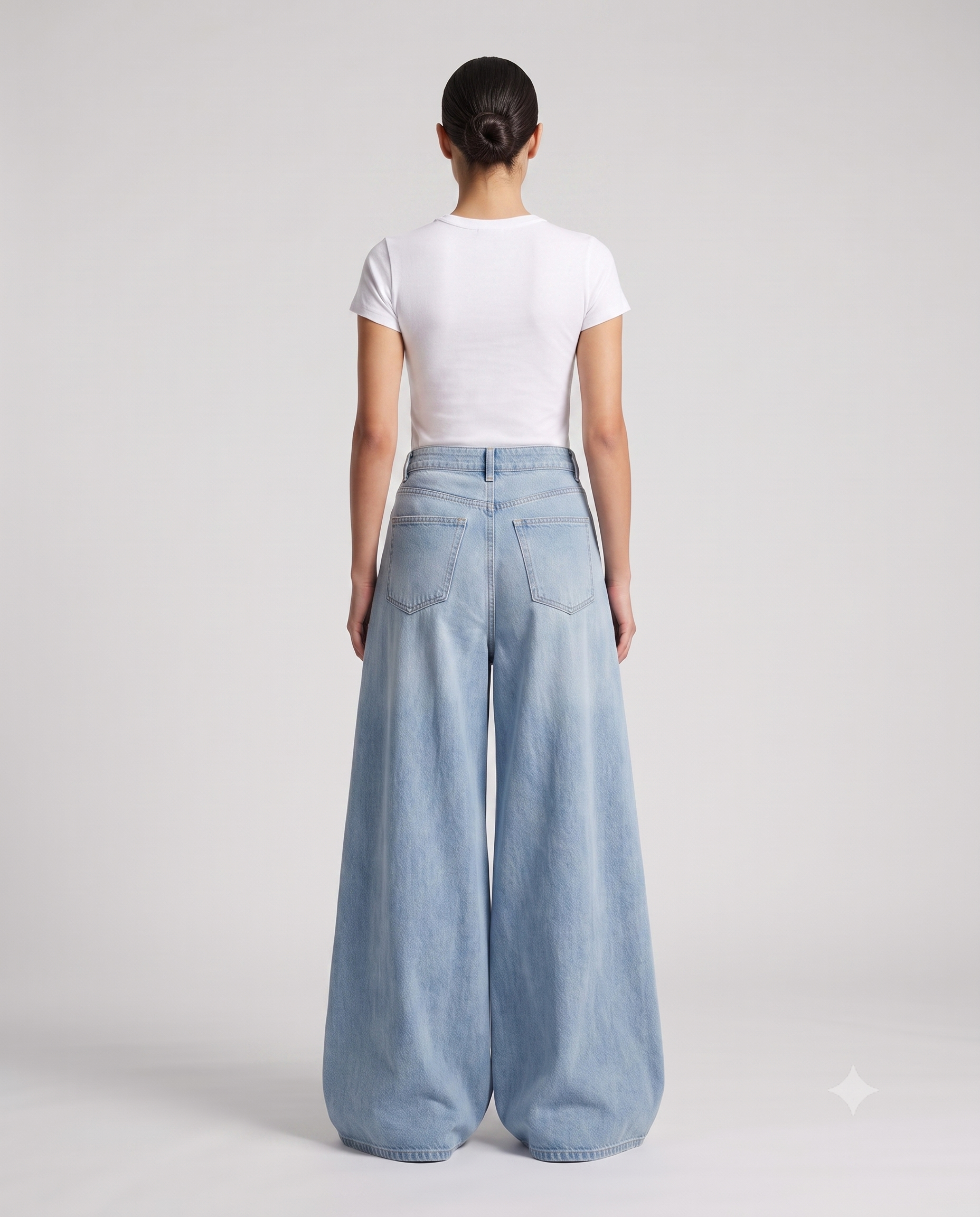 Women's Distressed Baggy Jeans Eyelet Fade on model — back view